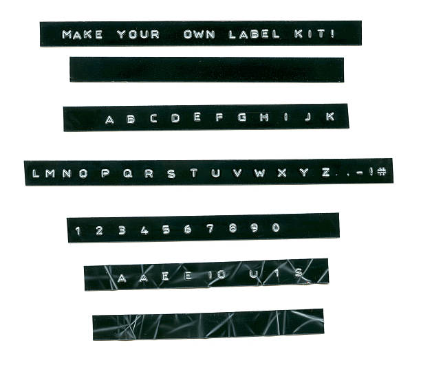 Embossed Label Letters Kit Full set of embossed letters, numbers and characters to make your own embossed label note.  One new blank label and one worn blank label for a grunge/used look, you create the message. adhesive tape stock pictures, royalty-free photos & images