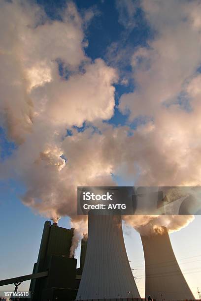 Power Plant Smoking And Steaming Stock Photo - Download Image Now - Air Pollution, Carbon Dioxide, Chemical Plant