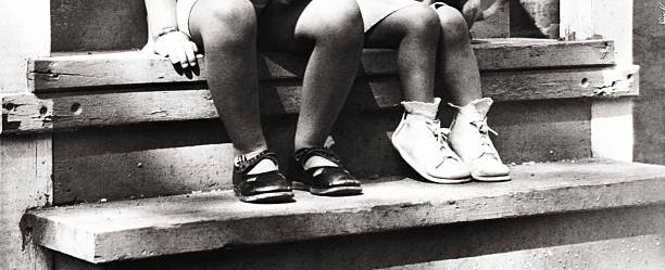 istock Two Childrens Sneakers and Sandals 157165624