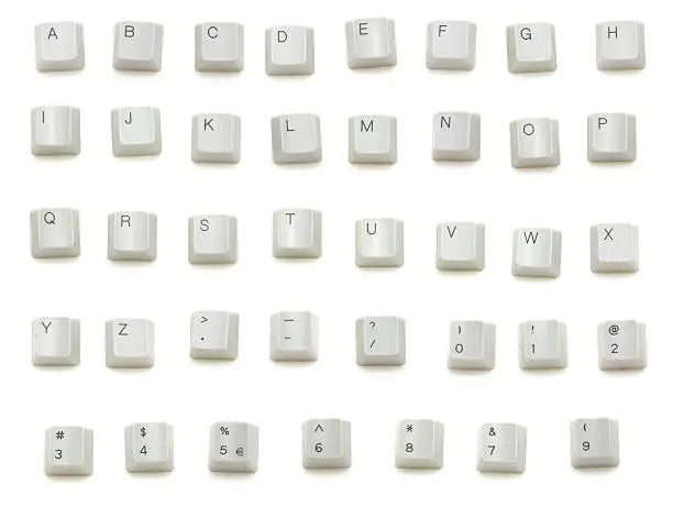 Keys from a keyboard isolated on white.  Write your own message.  Includes full alphabet and numbers.