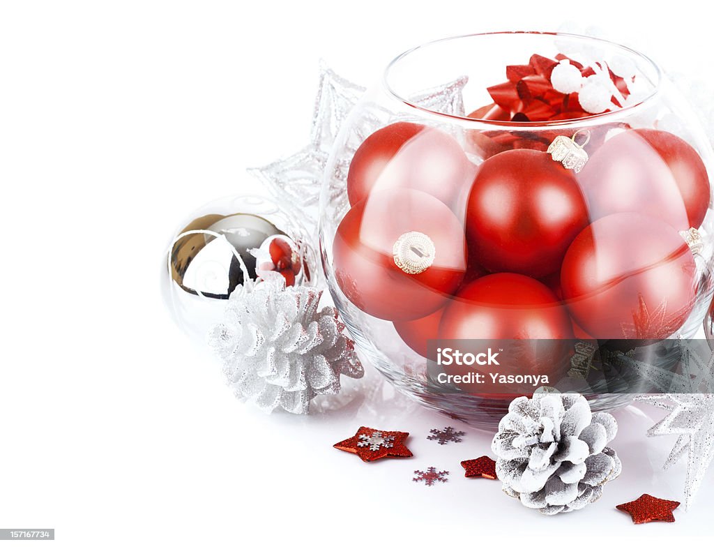 christmas red balls with festive tinsel christmas red ball with festive tinsel isolated on white background Bright Stock Photo