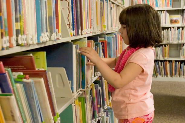 istock Girl at the public library 157168111