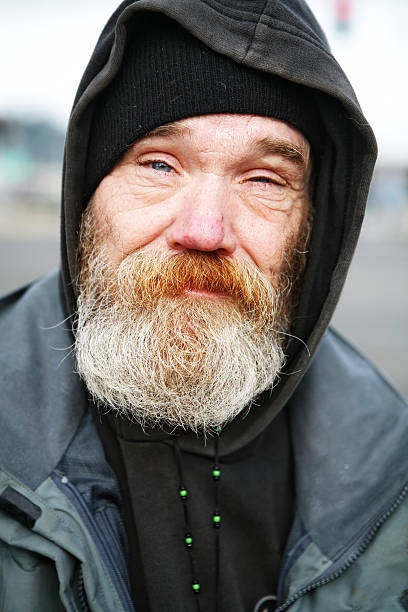 istock Homeless Man Bundeled Up in a Hat and Jacket 157168258