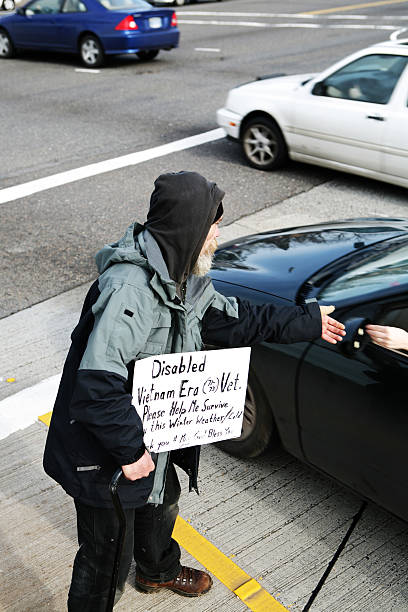 istock Homeless Man Asking for Money 157168261