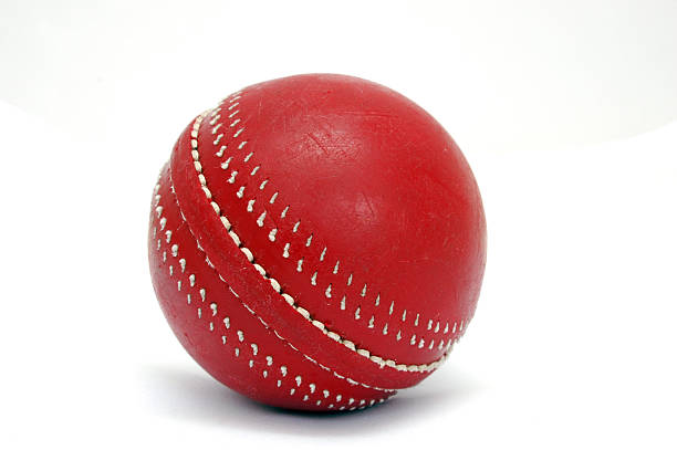 Close-up of a red cricket ball stock photo