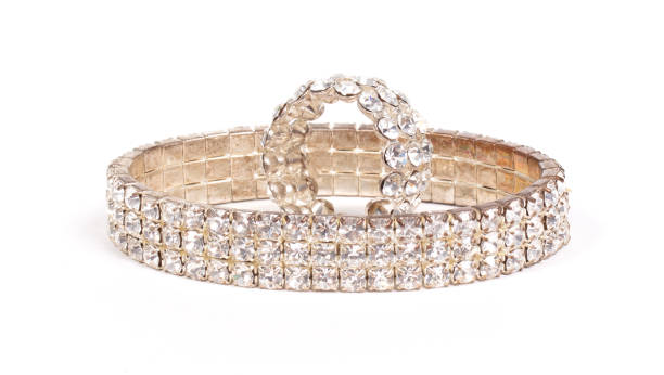 istock Diamond bracelet and ring isolated on white background 1571689508