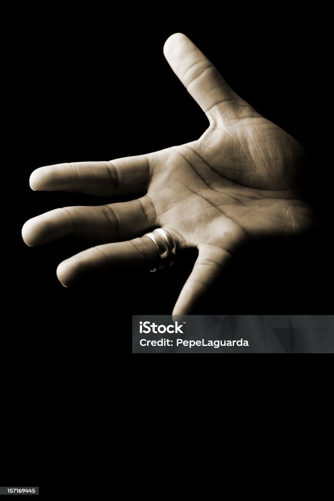 Hand palm Hand palm on a black background. Adult Stock Photo