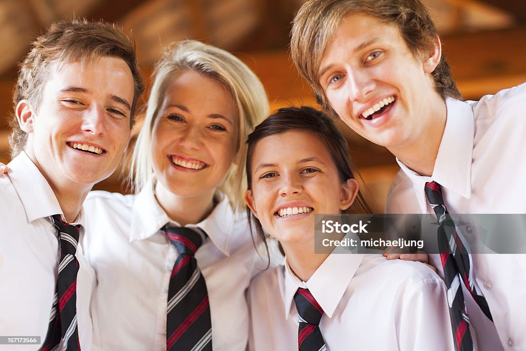 group of happy high school students group of happy high school students closeup Uniform Stock Photo