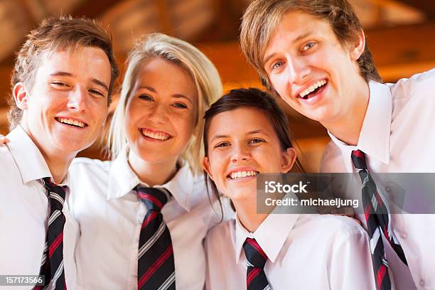 Group Of Happy High School Students Stock Photo - Download Image Now - Uniform, High School Student, Adolescence