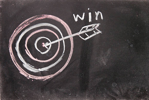 istock The arrow of win hit target 157173593