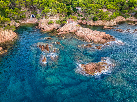 Aerial view of empty transparent sea water in aigua xelida beach early in the morning. Begur, Costa brava, Catalonia, Spain