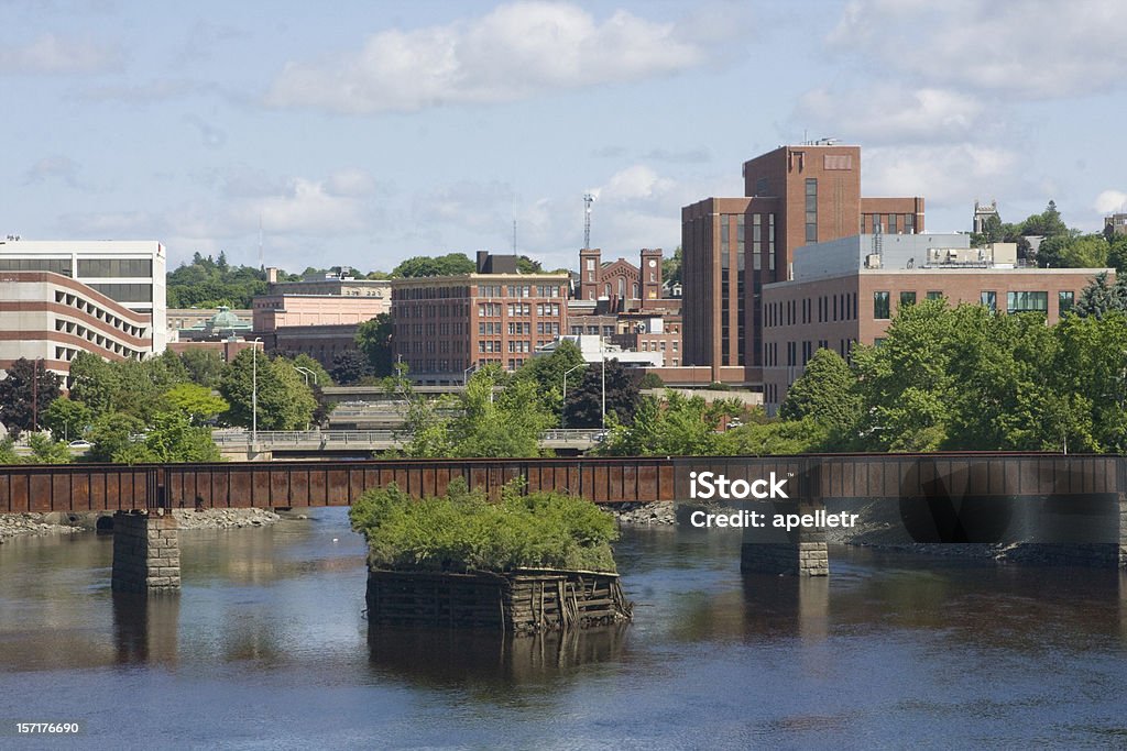 River with a low bridge in Bangor, Wales Bangor, Maine.   Bangor - Maine Stock Photo