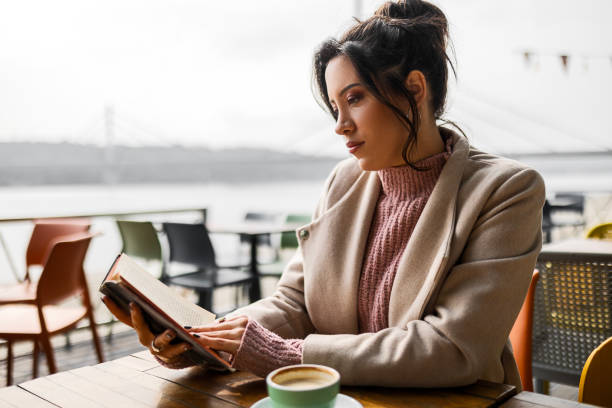 istock A Young Woman's Coffee-Fueled Reading Retreat 1571772588