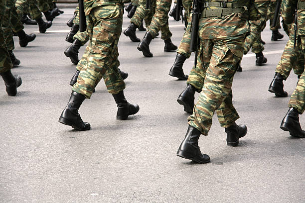 Military boots  marching stock pictures, royalty-free photos & images