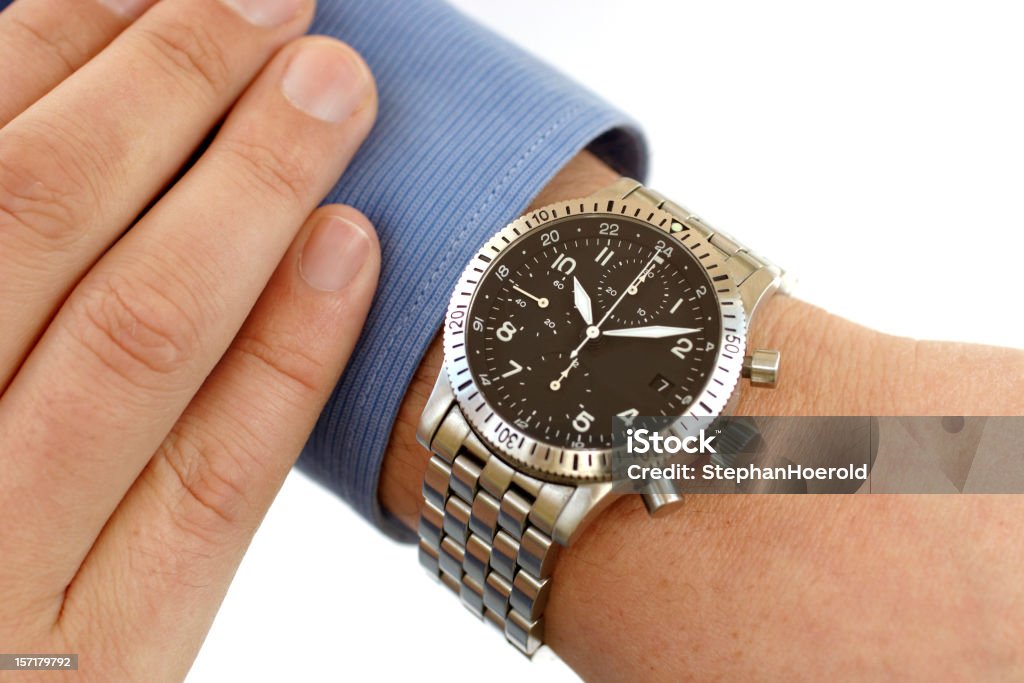 Focus on wrist watch as metaphor for how time flies  Time Flies Stock Photo