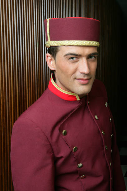 Bellboy A helpful bellboy in his uniform. bellhop stock pictures, royalty-free photos & images