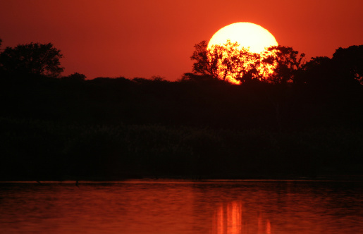 sunset at the sabie river, kruger park, south africa