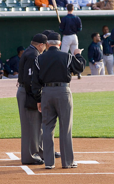 istock Umpire Meeting on the Plate 157180783