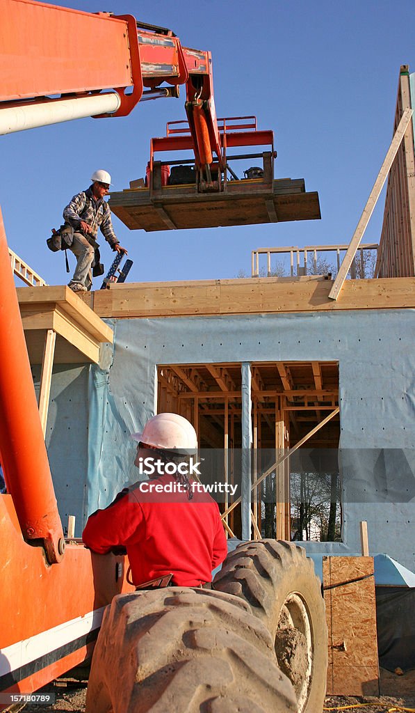 Construire une maison - Photo de Adulte libre de droits