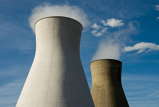 istock Steam rising from cooling towers 157180839