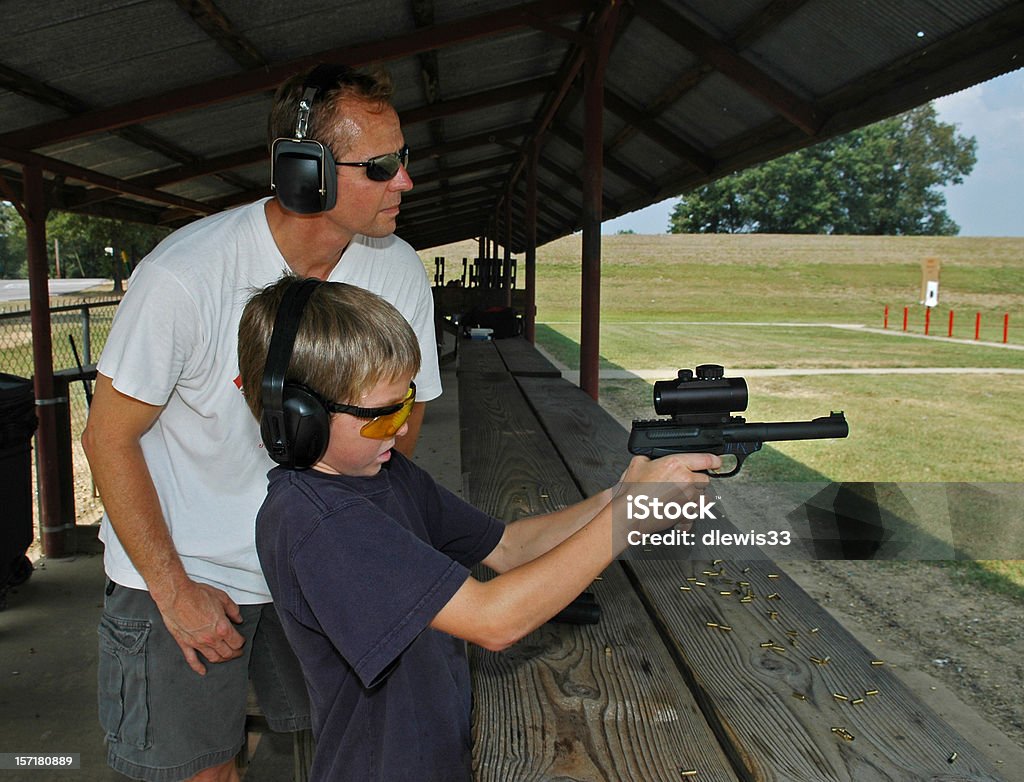 Père et fils de chasse des leçons - Photo de Fils de libre de droits