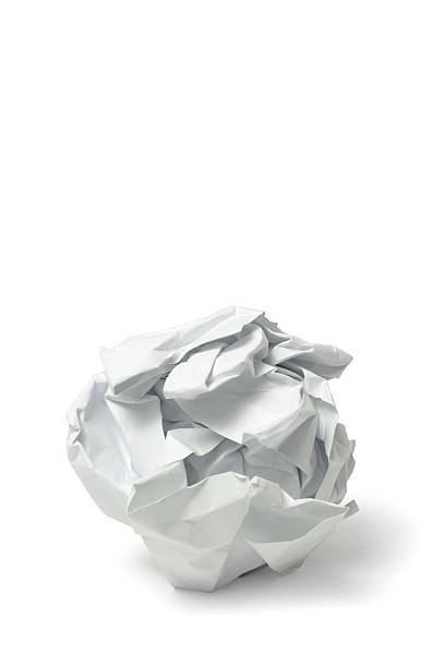 Crumbled Paper  crumpled paper ball stock pictures, royalty-free photos & images