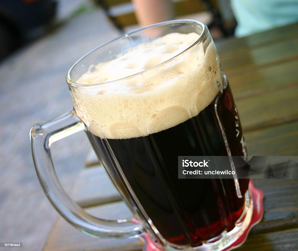 Large Dark Beer glass Prague  Beer - Alcohol Stock Photo
