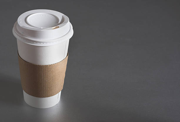 Average coffee cup with blank sleeve to advertise coffee stock photo