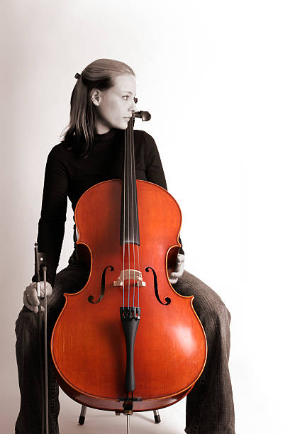 istock Blond woman playing cello (cellist) 157181851