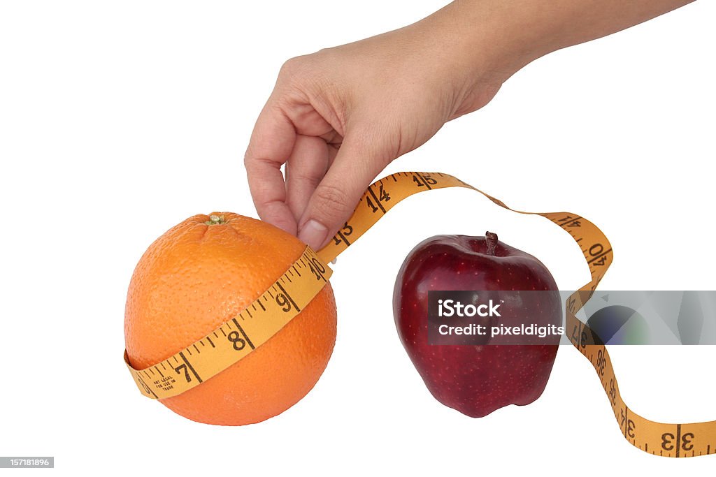 Сравнение яблоки и апельсинов или потеря веса - Стоковые фото Апельсин роялти-фри