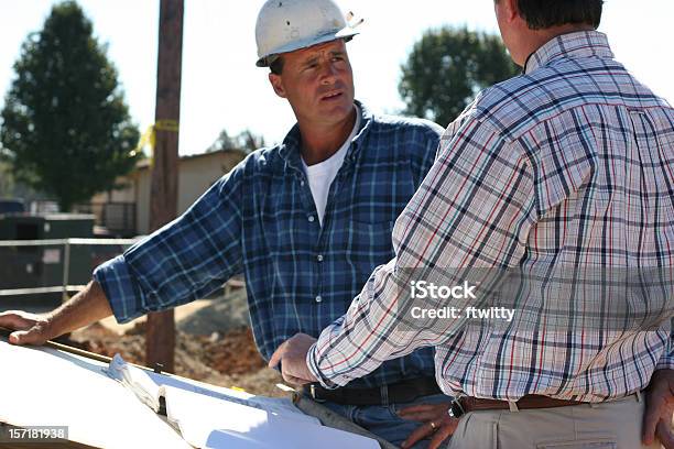 Construction Communication Stock Photo - Download Image Now - Building Exterior, Conspiracy, Construction Industry