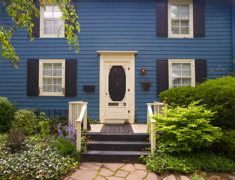 Traditional North American style residental houses on mature street with nice landscaping