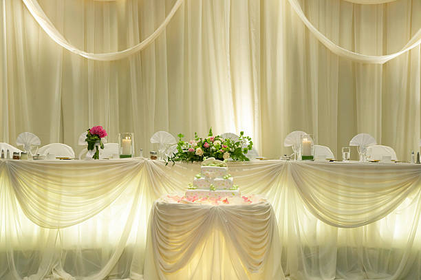 Head table with the Cake  wedding hall stock pictures, royalty-free photos & images