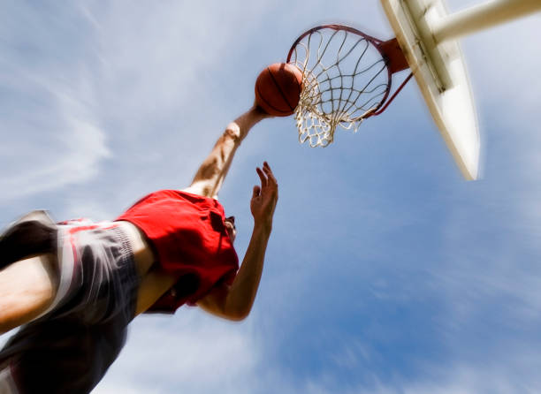 Sports: Man Playing Basketball: Slam Dunk