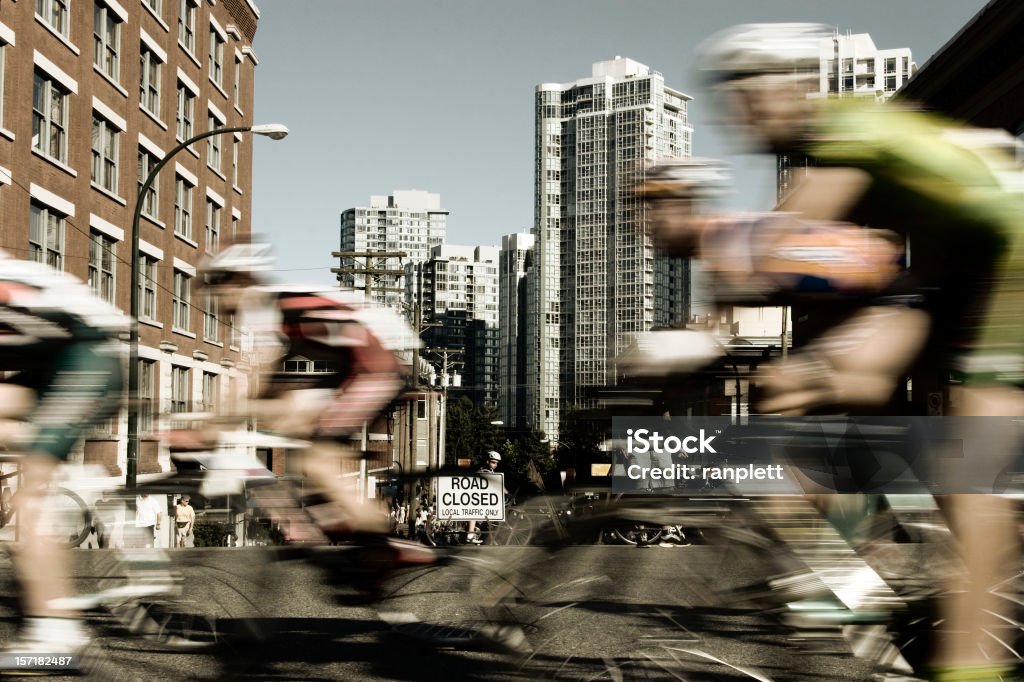 Bike Race A bike race with motion blur to emphasize the speed. The racers are blurred, and the rest of the shot is perfectly sharp. Achievement Stock Photo