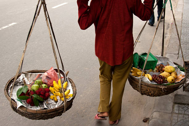 istock carrying tropical fruits 157184450