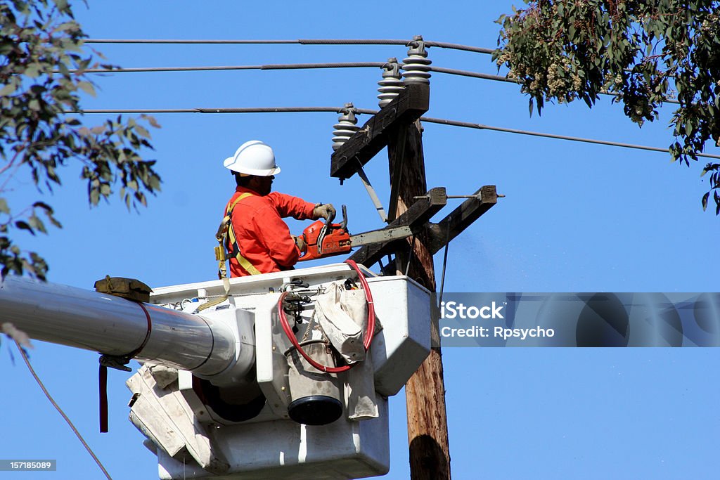 Potencia Workman, horizontal - Foto de stock de Corte de luz libre de derechos