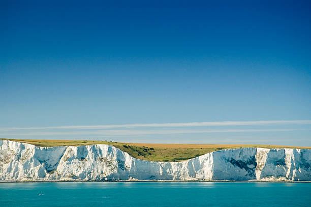 The White Cliffs of Dover White cliffs overlooking the beautiful calm sea. kent england photos stock pictures, royalty-free photos & images