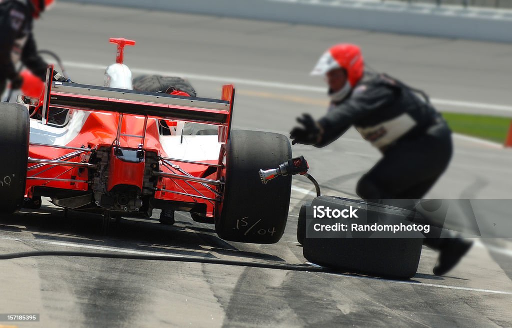 Pit Stop Tires are replaced rapidly on a pitstop during the race. Pit Stop Stock Photo