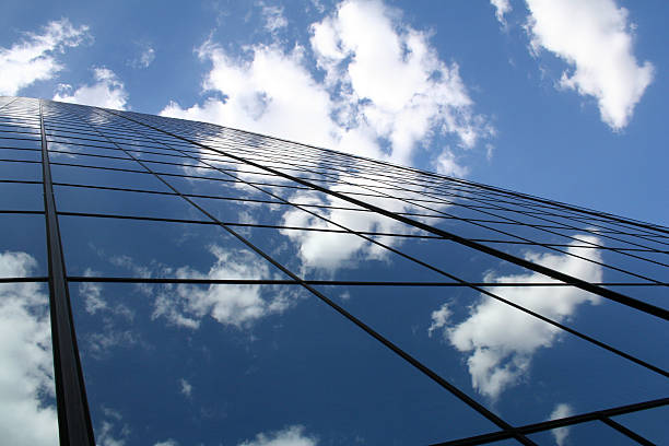 istock Skyscraper Reflecting The Cloud In Its Mirrored Walls 157185855