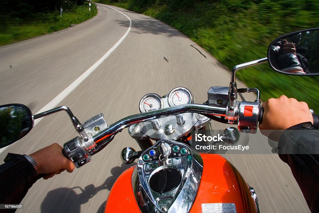 Biker Motorbiking from a diffrent view. Motorcycle Stock Photo