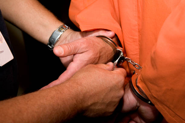 istock Incarceration, Man in Handcuffs. 157186045