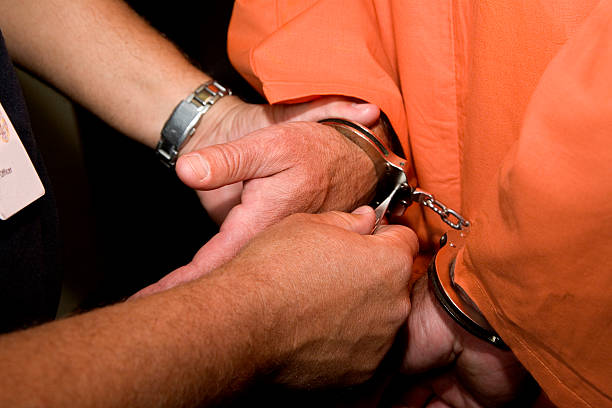 Incarceration, Man in Handcuffs.  criminal stock pictures, royalty-free photos & images