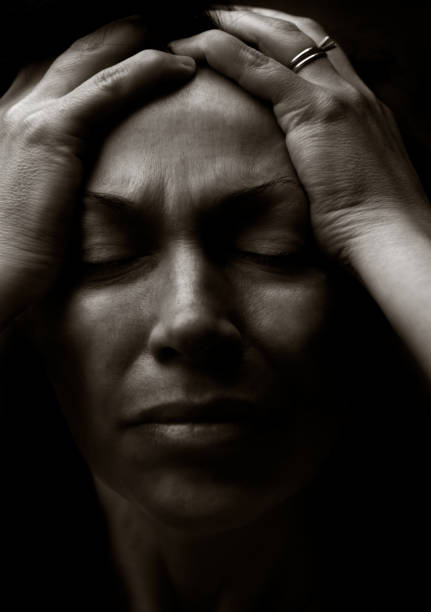A woman with pain on her face