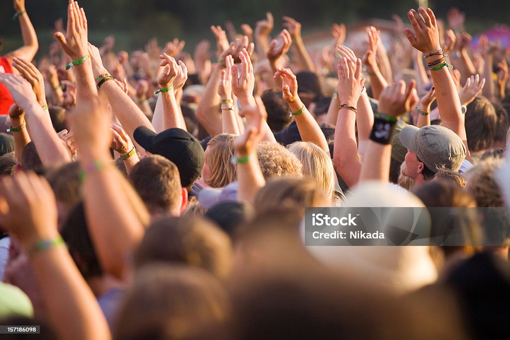 rock concert hands up in a open air rock festival Dancing Stock Photo