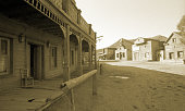 Wild West, old wooden buildings, houses, sepia toned