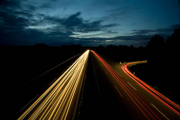 istock highway in the dark II 157186225