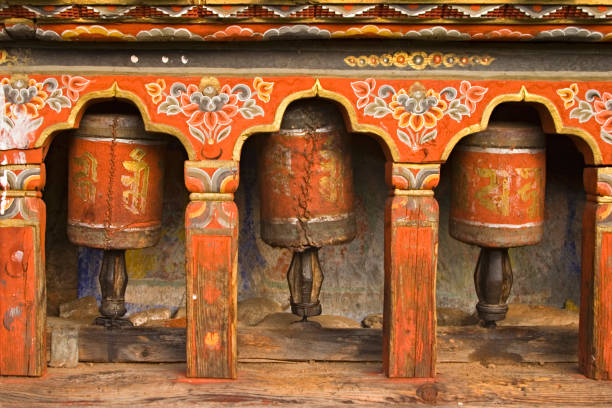 istock Bhutan - Old Prayer Wheels at Monastery 157186232