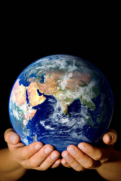 istock Earth in my hands - Asia 157186377