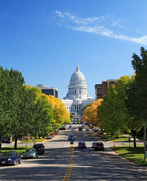 Wisconsin state capitol and street traffic stock photo